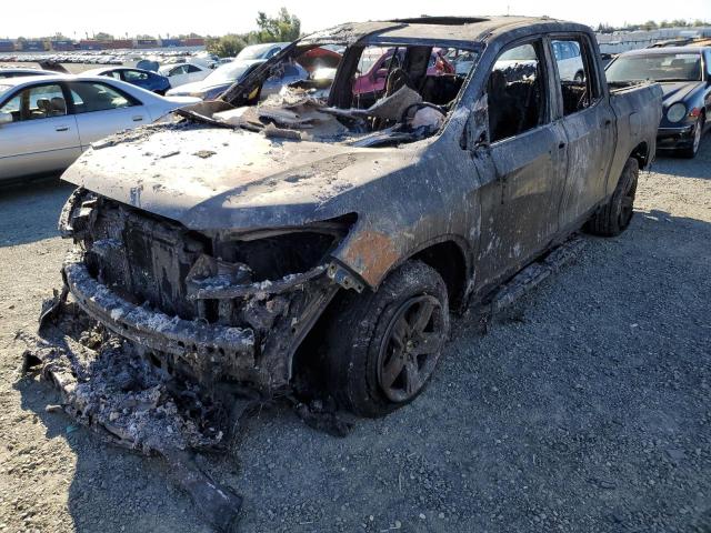 Photo 2 from auction – 2021 HONDA RIDGELINE with VIN 5FPYK3F71MB003412