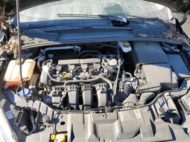 Foto 7 de la subasta – 2018 FORD FOCUS S con VIN 1FADP3E25JL228428