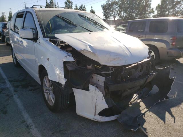 DODGE GRAND CARA 2015 with VIN 2C4RDGCG7FR607654 - Photo from auction