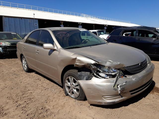 TOYOTA CAMRY LE 2004 with VIN 4T1BF32K54U569508 - Photo from auction