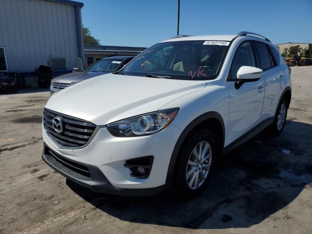 Photo 2 from auction – 2016 MAZDA CX-5 TOURI with VIN JM3KE2CY7G0806457