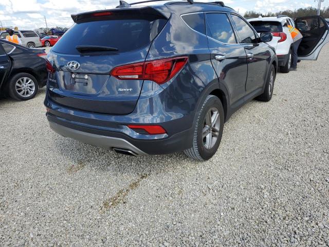 Photo 4 from auction – 2017 HYUNDAI SANTA FE S with VIN 5NMZU3LBXHH023968