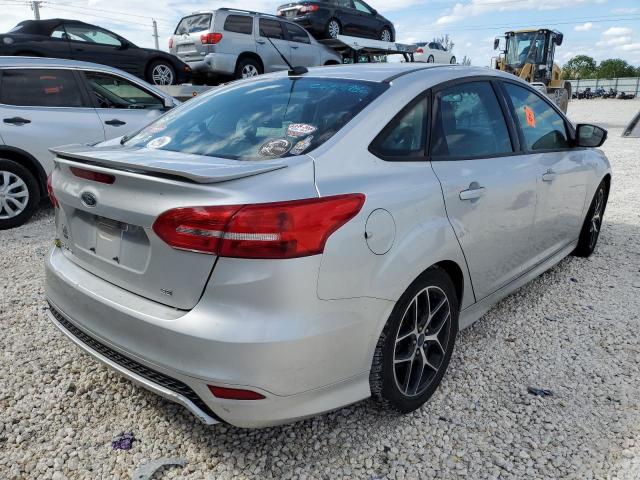 Photo 4 from auction – 2016 FORD FOCUS SE with VIN 1FADP3F25GL399512