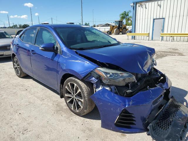 TOYOTA COROLLA L 2017 with VIN 5YFBURHE9HP657172 - Photo from auction