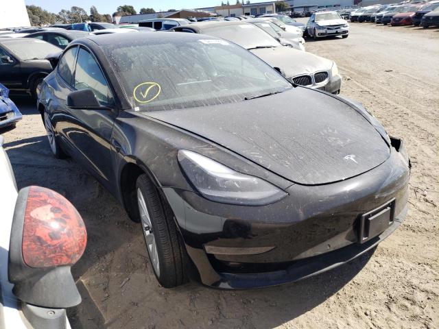 TESLA MODEL 3 2022 with VIN 5YJ3E1EB2NF285825 - Photo from auction