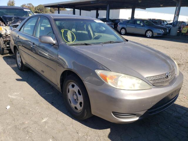 TOYOTA CAMRY LE 2002 with VIN JTDBE32K320042143 - Photo from auction