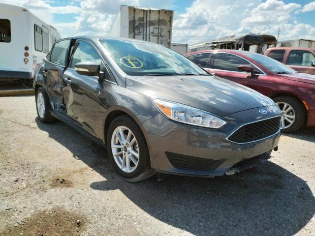 FORD FOCUS SE 2017 with VIN 1FADP3F20HL214610 - Photo from auction