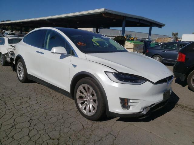TESLA MODEL X 2016 with VIN 5YJXCBE24GF012854 - Photo from auction