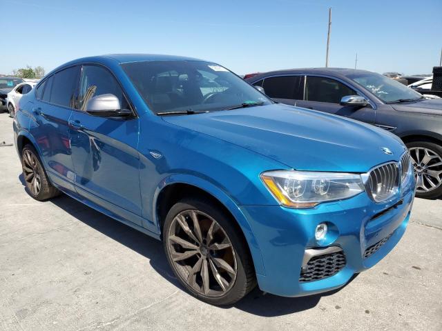 BMW X4 XDRIVEM 2016 with VIN 5UXXW7C54G0M91095 - Photo from auction