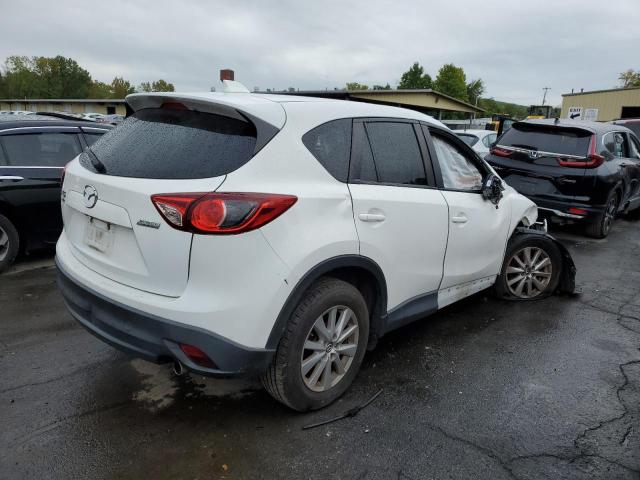 Photo 4 from auction – 2014 MAZDA CX-5 TOURI with VIN JM3KE4CY4E0406784