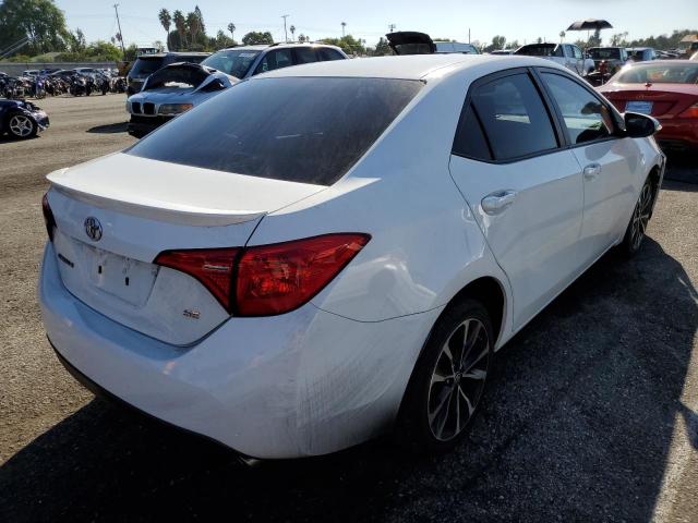 Photo 4 from auction – 2018 TOYOTA COROLLA L with VIN 5YFBURHEXJP764611