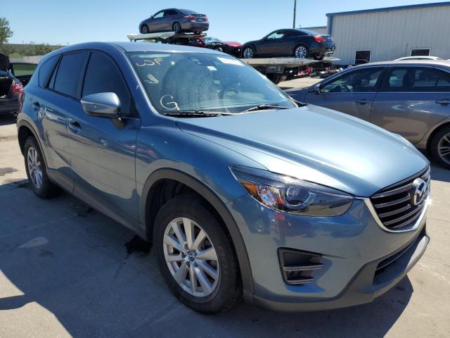 MAZDA CX-5 TOURI 2016 with VIN JM3KE2CY4G0693549 - Photo from auction
