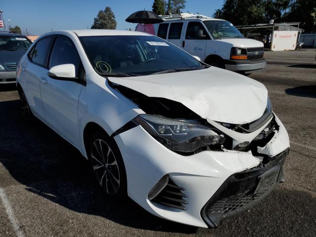 TOYOTA COROLLA L 2018 con VIN 5YFBURHEXJP764611 - Foto de la subasta