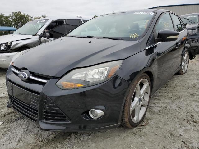 Photo 2 from auction – 2014 FORD FOCUS TITA with VIN 1FADP3J25EL359774