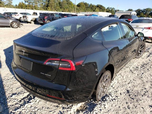 Photo 4 from auction – 2022 TESLA MODEL 3 with VIN 5YJ3E1EB4NF290394