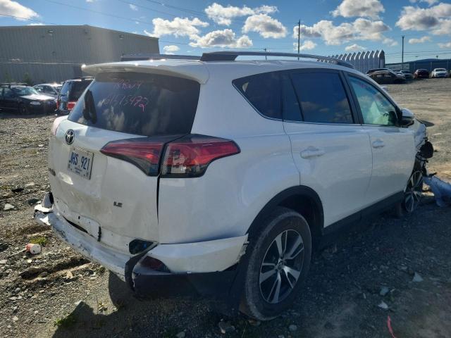 Photo 4 from auction – 2018 TOYOTA RAV4 LE with VIN 2T3ZFREV3JW431329