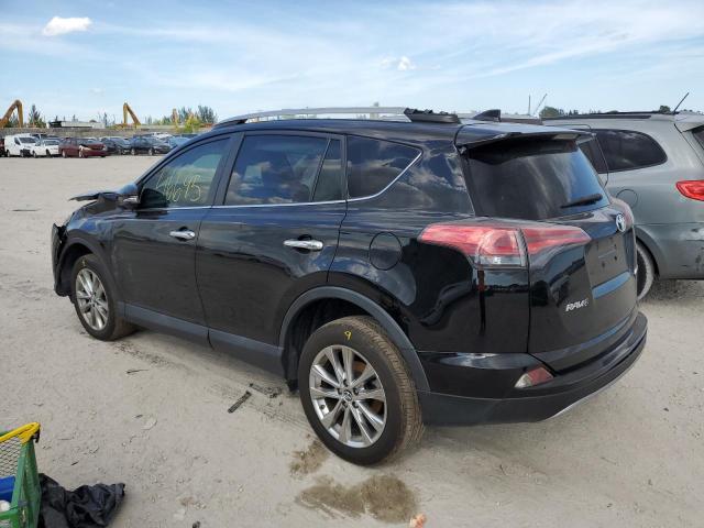 Photo 3 from auction – 2018 TOYOTA RAV4 LIMIT with VIN 2T3YFREV3JW509779
