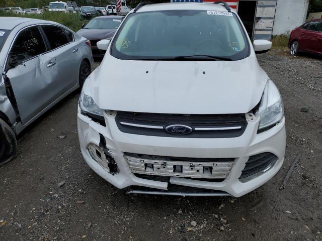 Photo 9 from auction – 2016 FORD ESCAPE SE with VIN 1FMCU9GX7GUB78415
