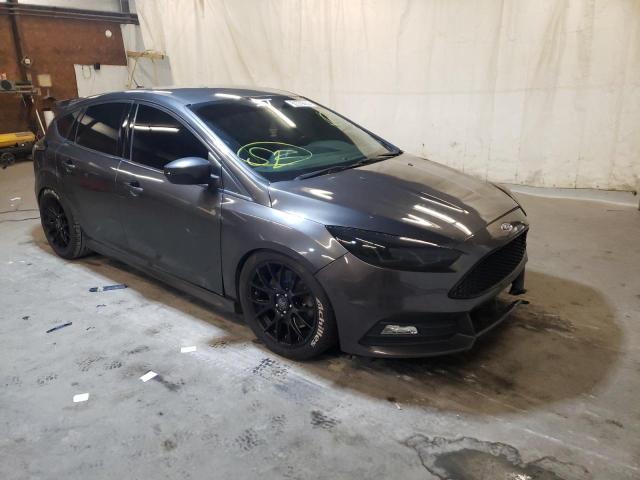 FORD FOCUS ST 2017 with VIN 1FADP3L90HL209490 - Photo from auction