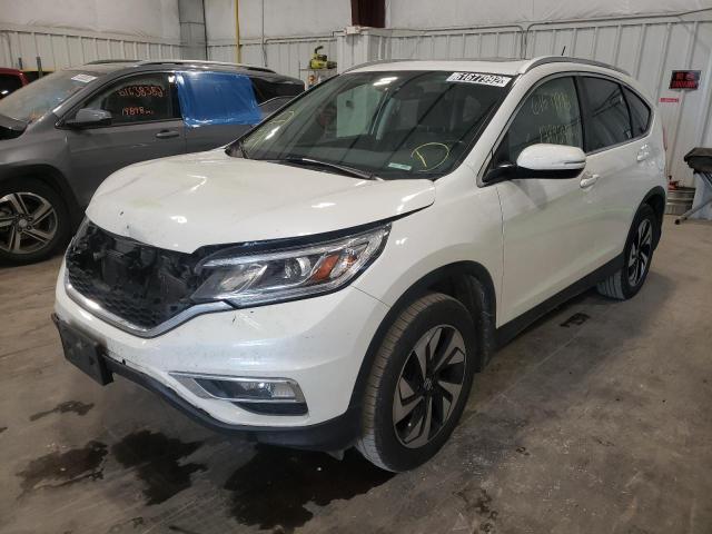 Photo 2 from auction – 2015 HONDA CR-V TOURI with VIN 5J6RM4H95FL072089