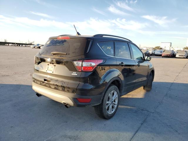 Photo 4 from auction – 2018 FORD ESCAPE SE with VIN 1FMCU0GD6JUA94286