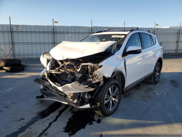 Photo 2 from auction – 2017 TOYOTA RAV4 XLE with VIN 2T3RFREV9HW545166