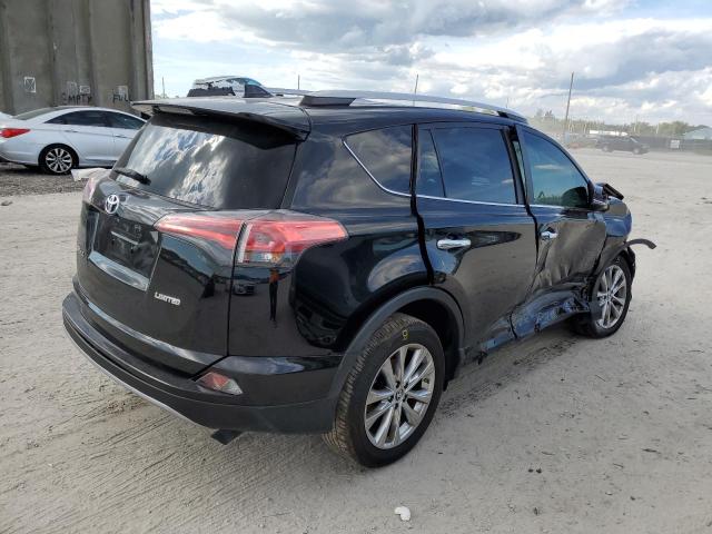 Photo 4 from auction – 2018 TOYOTA RAV4 LIMIT with VIN 2T3YFREV3JW509779