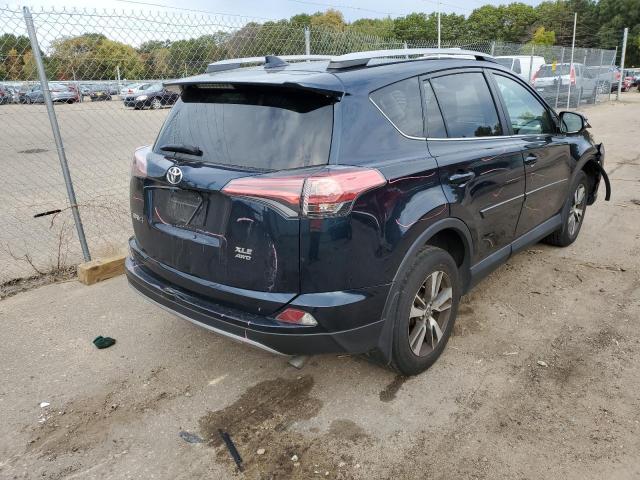 Photo 4 from auction – 2017 TOYOTA RAV4 XLE with VIN 2T3RFREV3HW669014