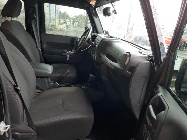Photo 5 from auction – 2016 JEEP WRANGLER U with VIN 1C4BJWDG0GL260682