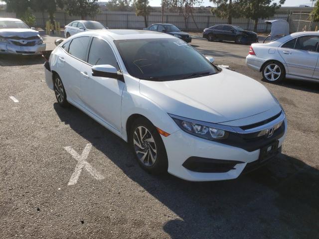 HONDA CIVIC EX 2018 with VIN 2HGFC2F73JH569358 - Photo from auction