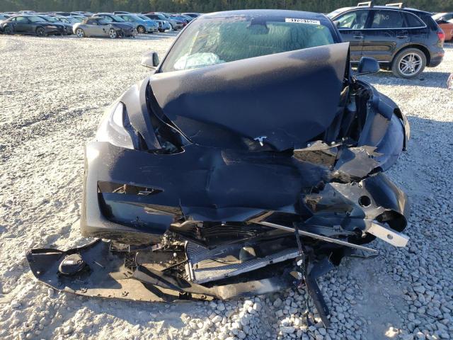 Photo 9 from auction – 2022 TESLA MODEL 3 with VIN 5YJ3E1EB4NF290394