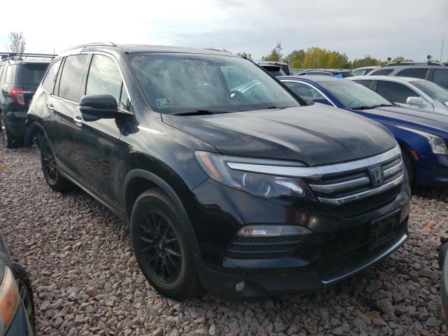 HONDA PILOT TOUR 2016 with VIN 5FNYF6H92GB066018 - Photo from auction