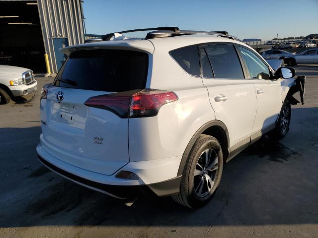 Photo 4 from auction – 2017 TOYOTA RAV4 XLE with VIN 2T3RFREV9HW545166