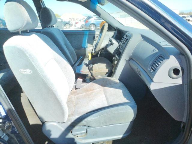 Photo 5 from auction – 2004 KIA OPTIMA LX with VIN KNAGD126745350662