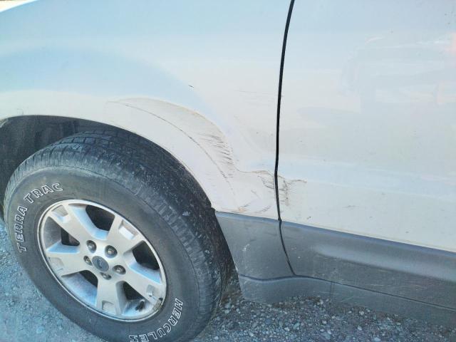 Photo 9 from auction – 2007 FORD ESCAPE XLT with VIN 1FMYU03Z07KA98717
