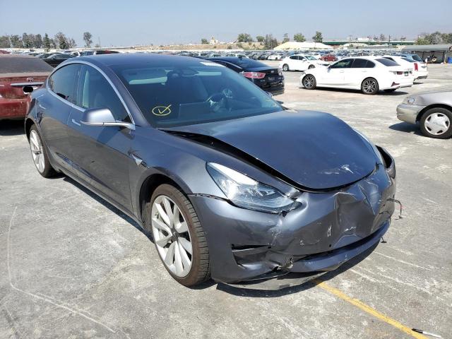 TESLA MODEL 3 2018 with VIN 5YJ3E1EA3JF010904 - Photo from auction