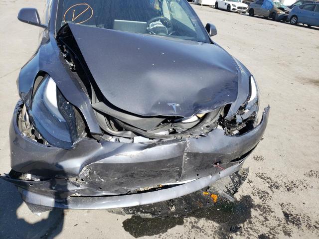 Photo 9 from auction – 2022 TESLA MODEL 3 with VIN 5YJ3E1EB7NF144815