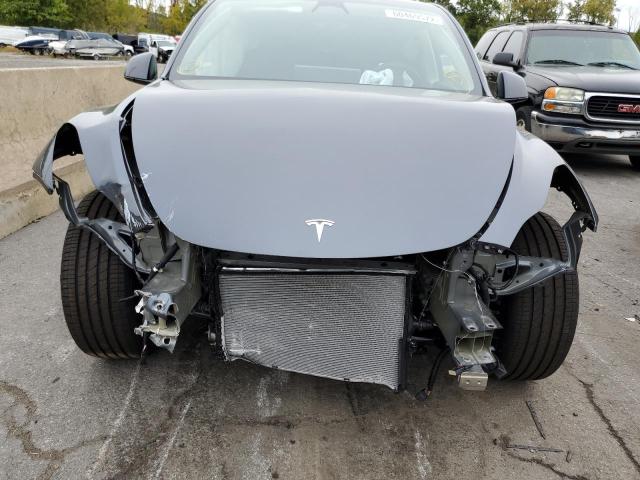 Photo 9 from auction – 2022 TESLA MODEL Y with VIN 7SAYGDEE1NA009289