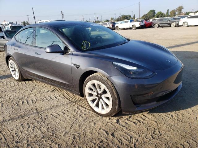 TESLA MODEL 3 2022 with VIN 5YJ3E1EBXNF144825 - Photo from auction