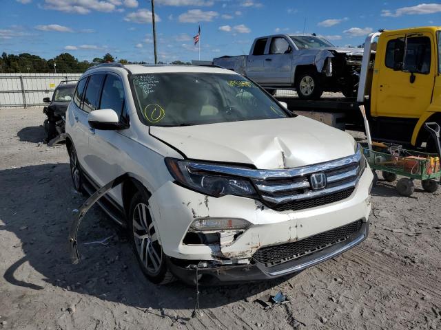 HONDA PILOT ELIT 2016 with VIN 5FNYF6H09GB104393 - Photo from auction