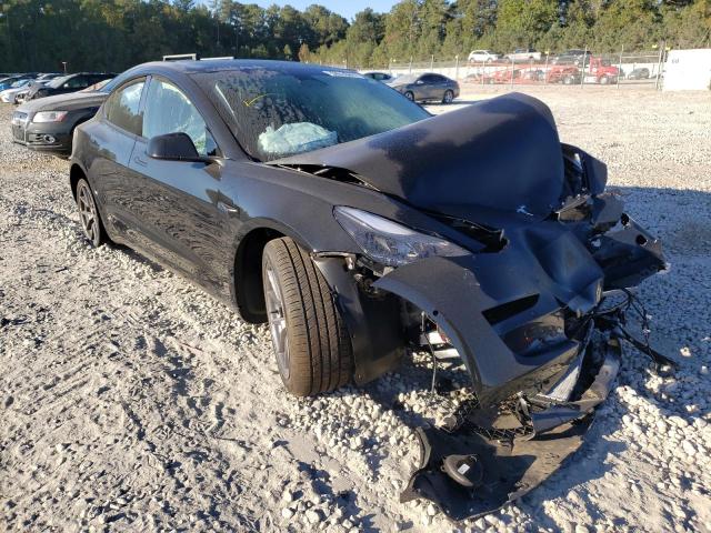 TESLA MODEL 3 2022 with VIN 5YJ3E1EB4NF290394 - Photo from auction