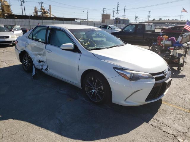 TOYOTA CAMRY LE 2017 with VIN 4T1BF1FK1HU433798 - Photo from auction