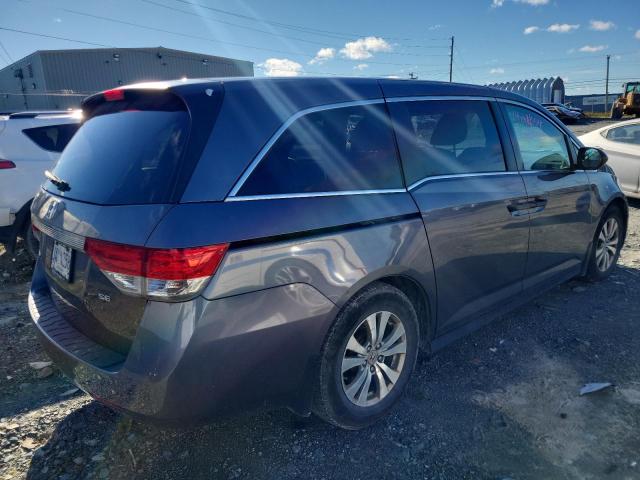 Photo 4 from auction – 2014 HONDA ODYSSEY SE with VIN 5FNRL5H38EB505352