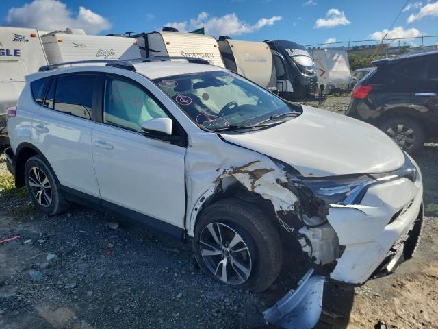 Photo 1 from auction – 2018 TOYOTA RAV4 LE with VIN 2T3ZFREV3JW431329