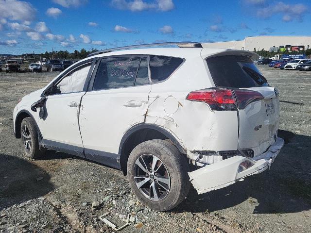Photo 3 from auction – 2018 TOYOTA RAV4 LE with VIN 2T3ZFREV3JW431329