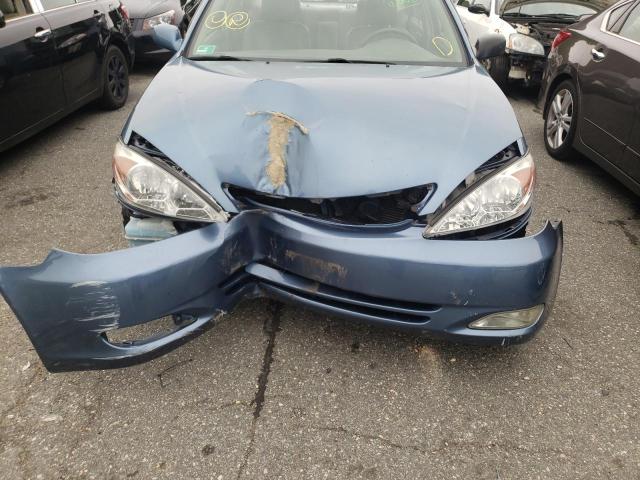 Photo 9 from auction – 2004 TOYOTA CAMRY LE with VIN 4T1BE30KX4U910598