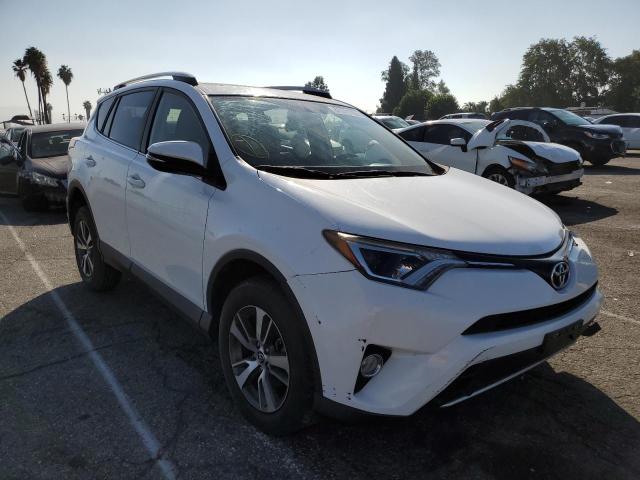 Photo 1 from auction – 2016 TOYOTA RAV4 XLE with VIN JTMWFREV0GJ060947