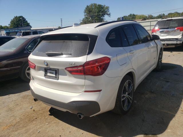 Photo 4 from auction – 2016 BMW X1 XDRIVE2 with VIN WBXHT3C36G5F63882