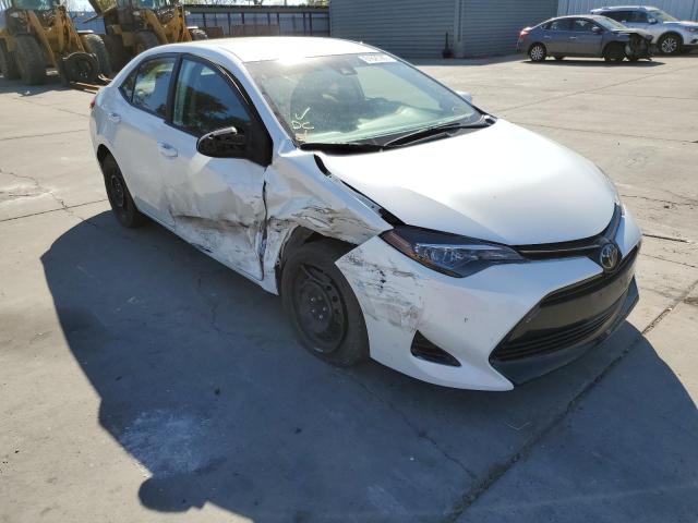 TOYOTA COROLLA L 2018 with VIN 5YFBURHE6JP791210 - Photo from auction