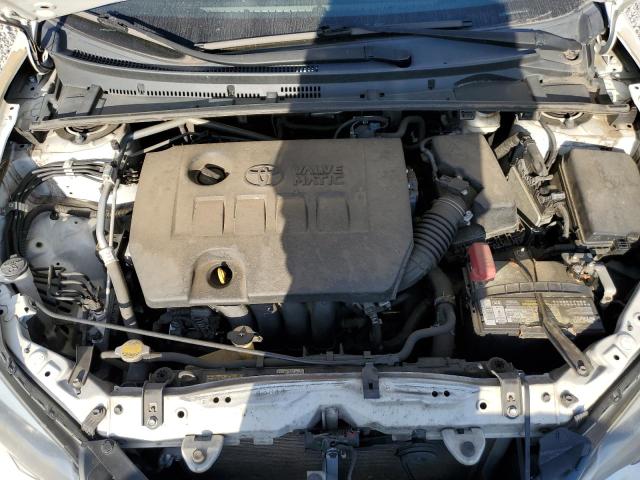 Photo 7 from auction – 2014 TOYOTA COROLLA EC with VIN 5YFBPRHE5EP019424
